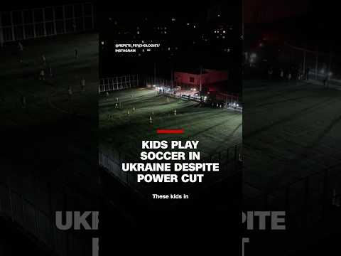 Kids play soccer in Ukraine despite power cut