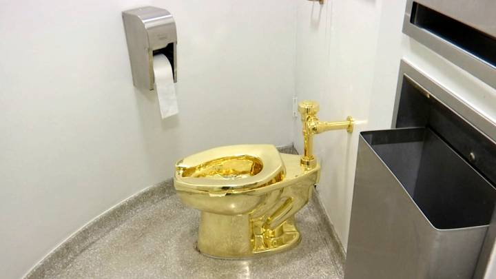 Flush with cash? Fully functional, solid gold toilet sells for $12.1M at auction