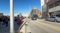 Neighbors rally at Mass Ave and College calling for safer street design