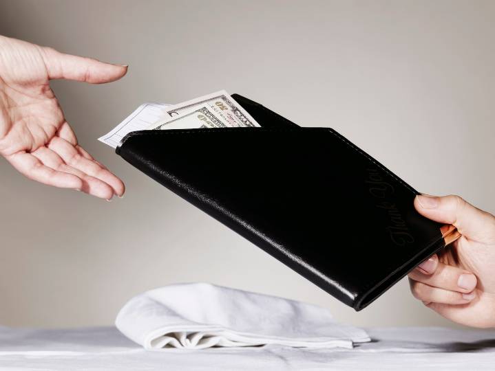 Miss Manners: Not once have my husband’s 2 financially stable sons offered to pay for a meal