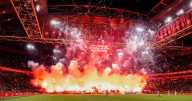 Ajax abandon game after five minutes after FIREWORKS display set off inside stadium