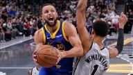 Curry torches Spurs again, rallies Warriors in 49