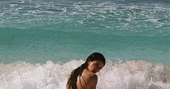 Kendall Jenner strips off at the beach exposing every bare inch of her curves