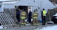 Police: 2 hospitalized, man charged after driving into side of Springfield Township home