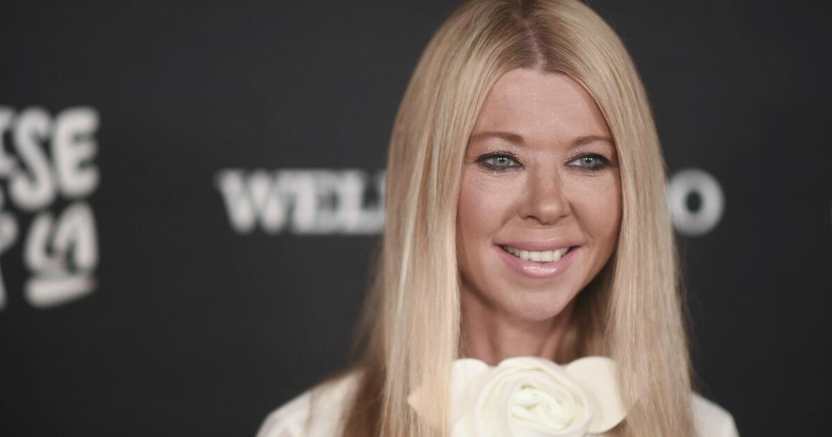 Tara Reid says a spiked drink 'knocked me out immediately' and led to her hospitalization