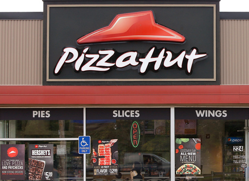 Pizza Hut's parent company says it's considering selling the chain