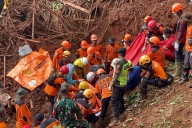 More bodies found after Indonesia landslides, raising toll to 23 with 28 missing