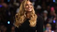 Beyoncé sizzles at the F1 Grand Prix in two plunging motorsport