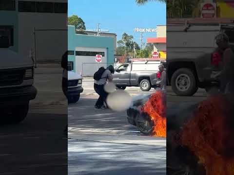HEROIC RESCUE: Good Samaritans leap into action as a car bursts into flames #shorts #usa #viral #us