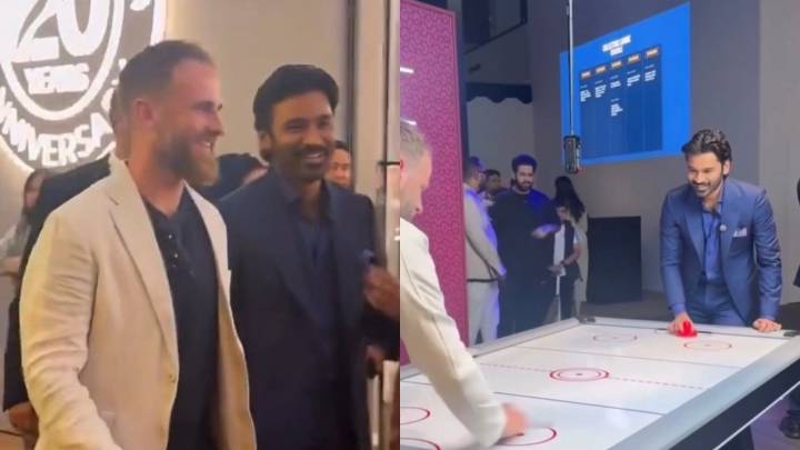 Dhanush and cricketer Kane Williamson play air hockey at Dubai Watch Week. Video