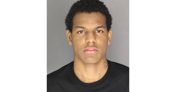 Man wanted in homicide at unauthorized barbershop at Detroit school, source says