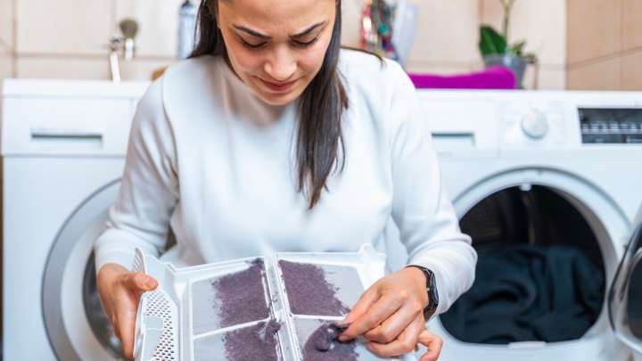 Dryer Lint Buildup Is Way Worse During Winter - Here's Why (& How To Prevent It)