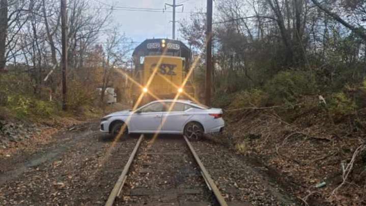 Driver lucky to escape with a minor injury after her car was struck by a freight train in N.J.