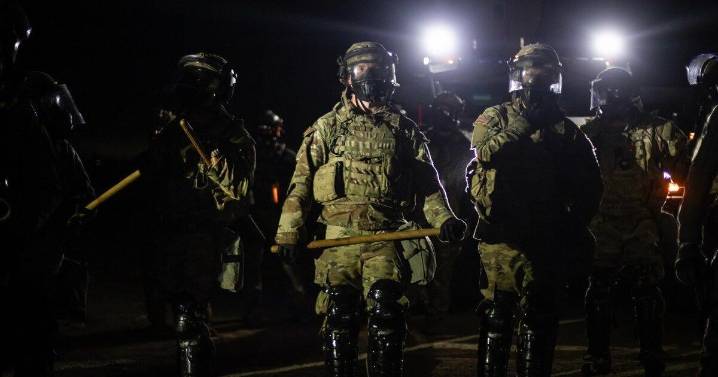 Trump administration sues California over law banning masked federal agents