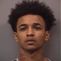 Region police say force justified in 2-year-old arrest video; accused now sought