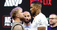 YouTuber-turned-boxer Paul dwarfed by Joshua in heavyweight fight face