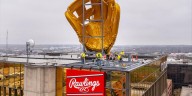 Rawlings adds giant gold glove to roof of St. Louis headquarters