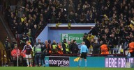 Aston Villa Europa League tie halted as away fans throw seats and drinks at police in violent scenes