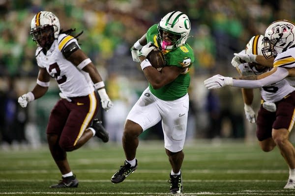 Minnesota falls 42–13 as Oregon QB Dante Moore shines