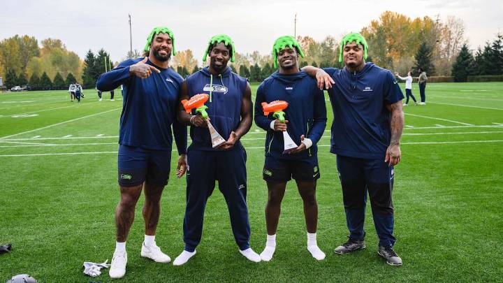 PHOTOS: DeMarcus Lawrence And Tyrice Knight Get Slimed After Being Awarded The NVP Award For Week 10