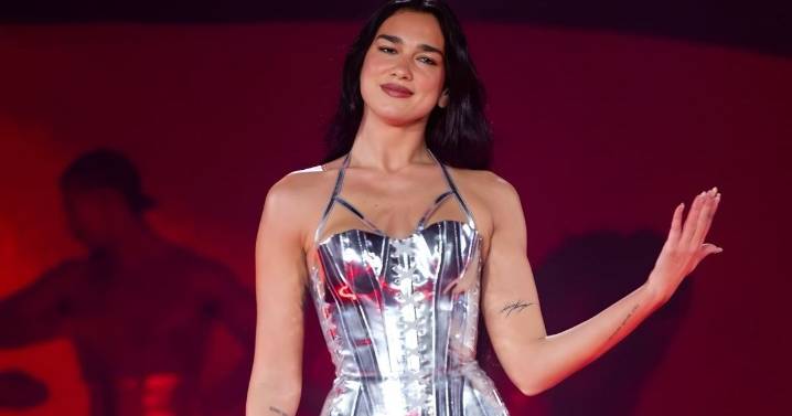 Photos: Dua Lipa Is 'Stunning as Always' in Silver Bodysuit