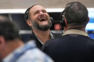 Mercados de EEUU cierran a la baja tras jornada de fuertes oscilaciones