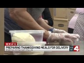 Volunteers at Brass Rails Restaurant help prep Thanksgiving meals for those in need