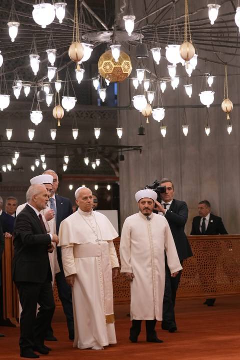 Pope visits Istanbul's Blue Mosque, but does not pray, as he focuses on unifying Christians