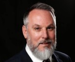 Catholic school board chairman returns