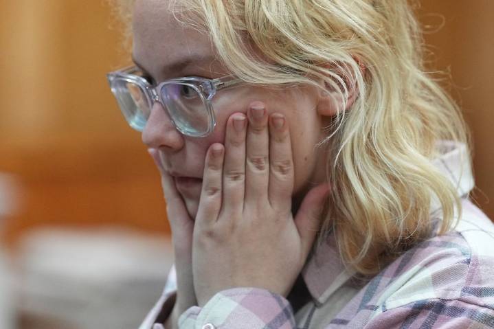 Russian court extends jailing of teenage singer over street performance of anti