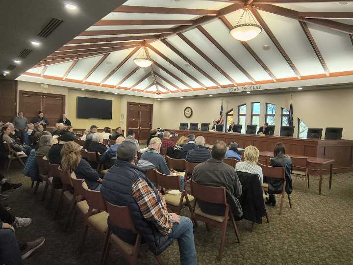 Over 150 people pack Clay hearing to fight eviction of 91