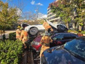 Out-Of-Control EV Launches Onto Two Cars In Bizarre Bethesda Office Lot Crash: Fire Officials
