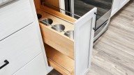 Why You Should Install A Vertical Drawer Beside Your Stove