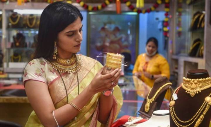 Gold and silver prices up by 2 pc over positive global cues