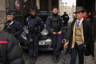 Fedora man pictured outside Louvre Heist is not actually a detective