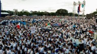 Hundreds of thousands rally in Manila against flood-control corruption scandal : NPR