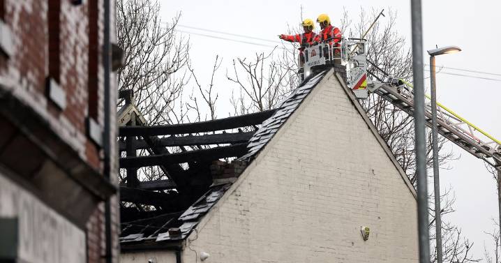 Residents 'hear bangs' at 3am as huge fire tears through garage leaving building unstable