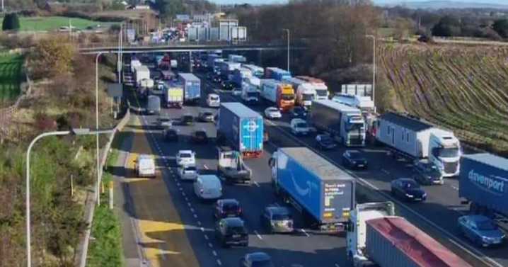 Man, 19, dies in motorway crash 'after fleeing car in police pursuit'
