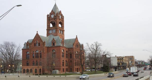 Mother of juvenile charged in double slaying forcibly removed from court