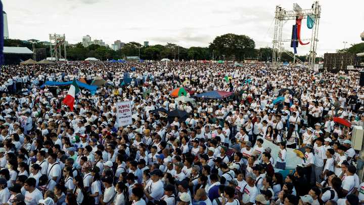 Hundreds of thousands rally in Manila against flood-control corruption scandal : NPR