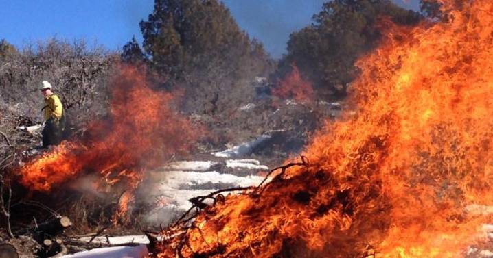Slash pile burning operation happening southeast of Cache Valley