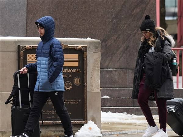 Record-low temperatures shock the South while snowfall blankets Great Lakes region