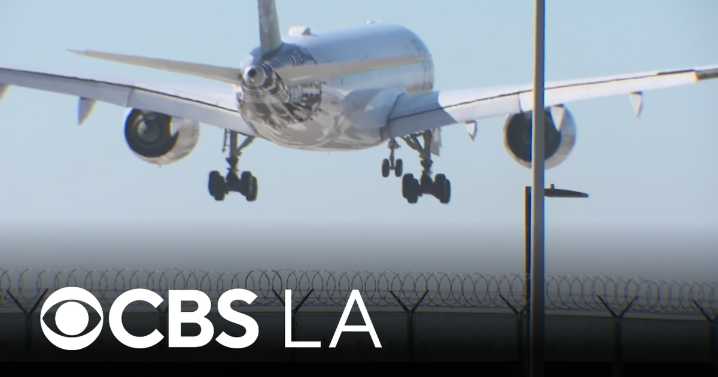 LAX faces delays and handful of cancellations first day of mandated restrictions