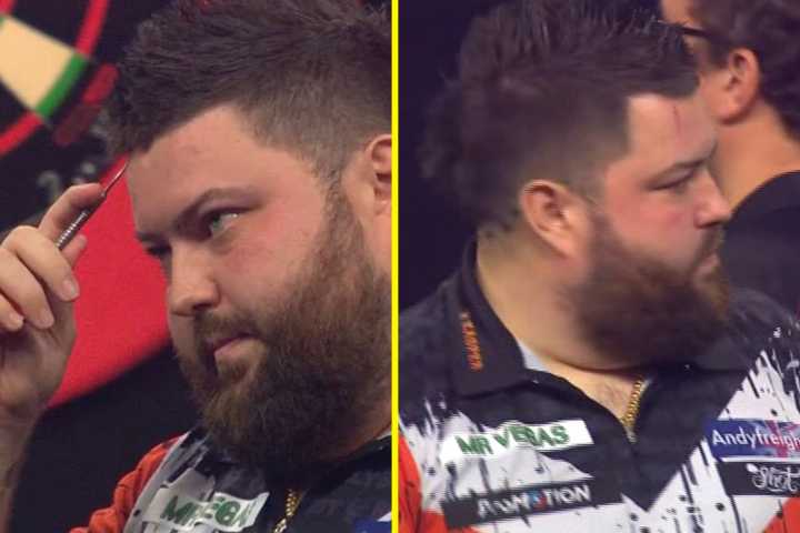 Michael Smith bizarrely cuts own face with dart to leave open gash in painful defeat to Luke Humphries