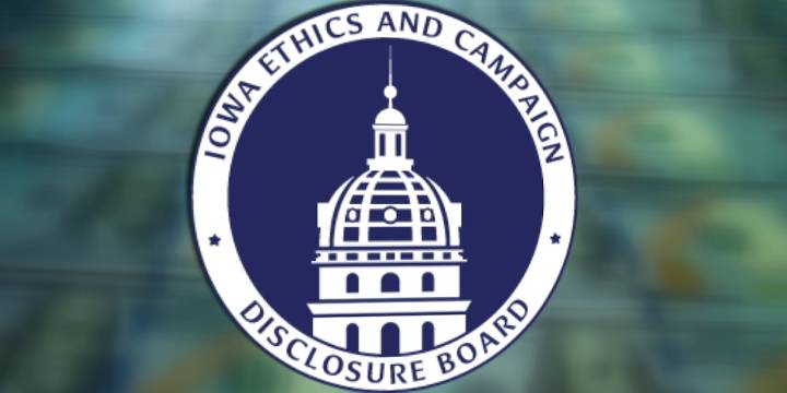 Iowa board sued over decision on corporate backing of candidates