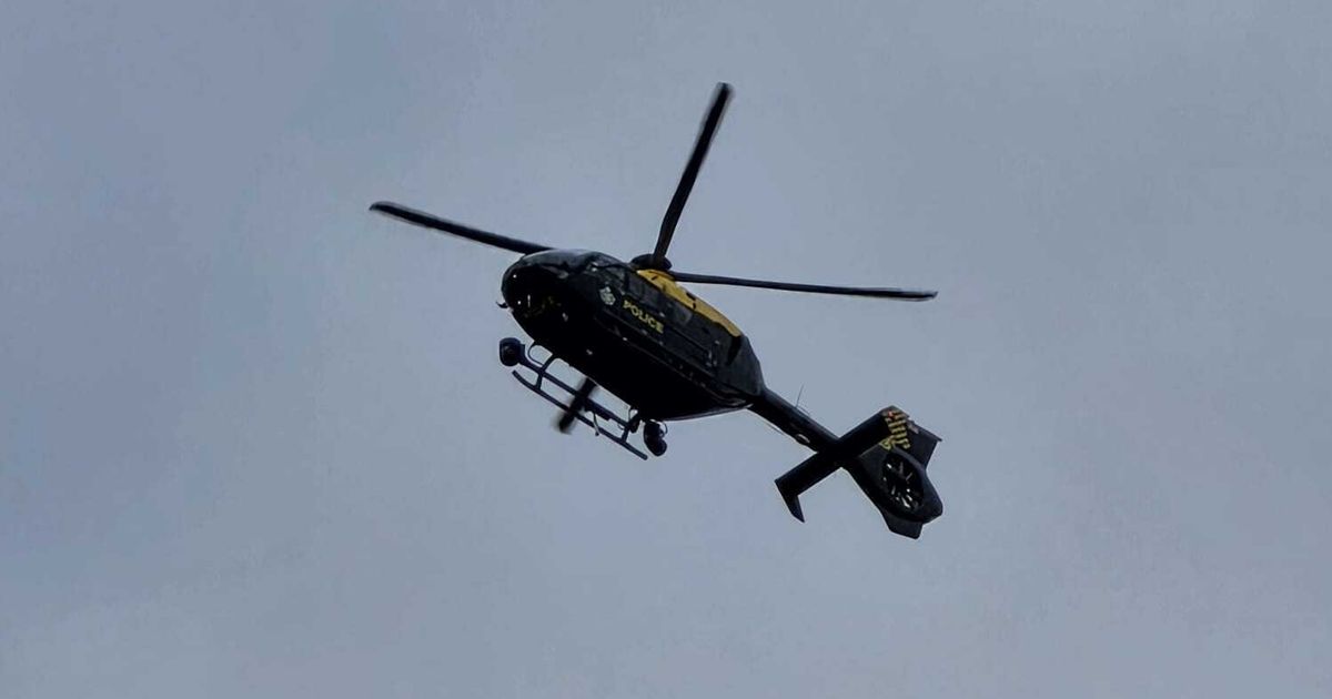 Police helicopter circles Bristol area in search for injured man