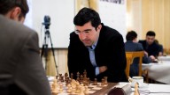 The chess federation accuses a former champion of harassing a rival who died