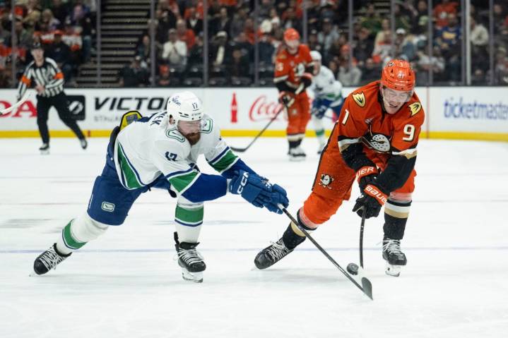 Ducks edged by Canucks on a pair of late goals