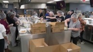 Mozel Sanders Foundation packs thousands of meals for Thanksgiving