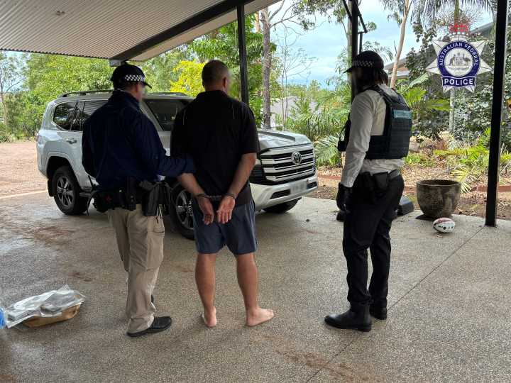 Three charged over $71m Defence Department fraud after AFP raids